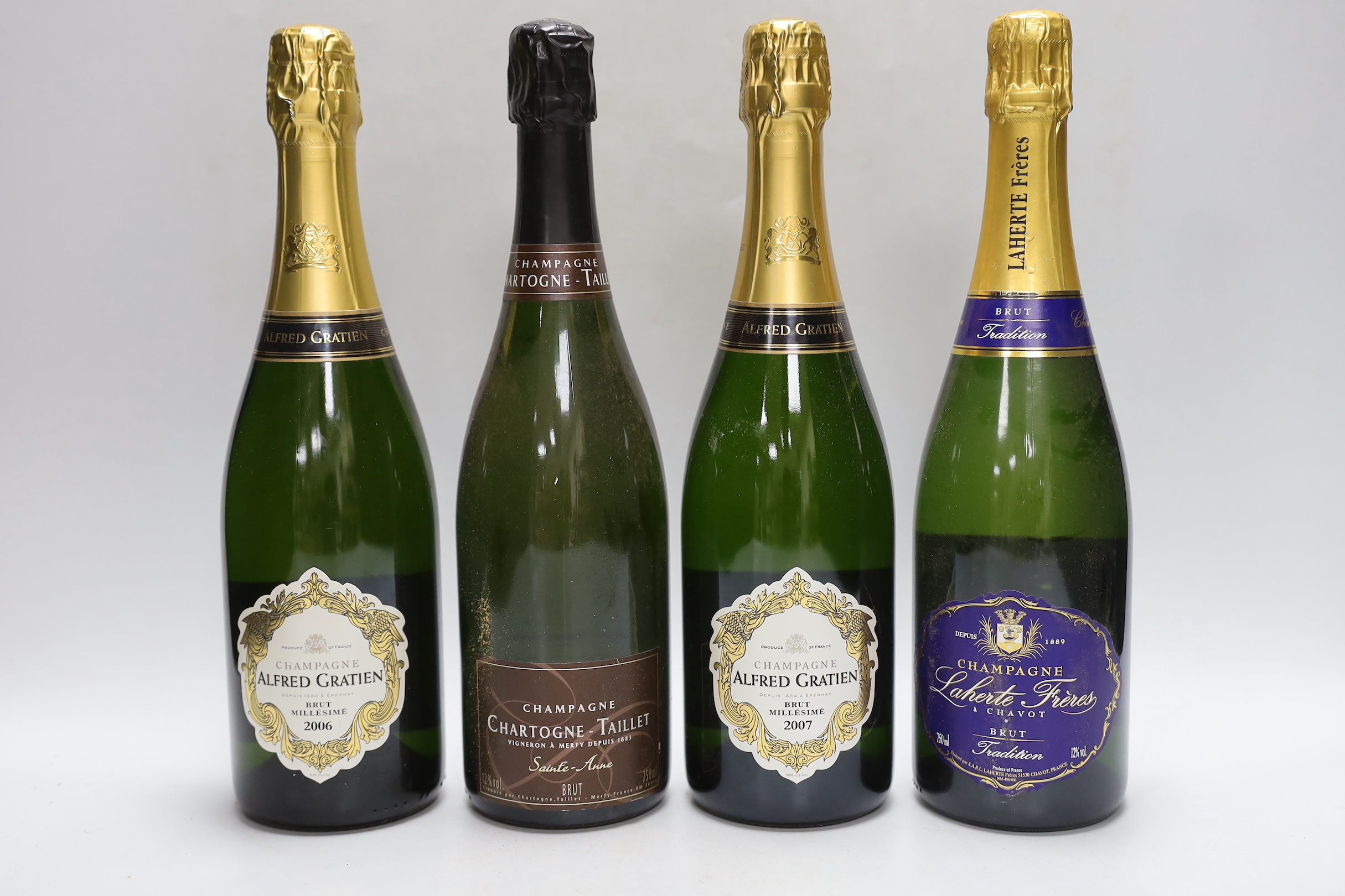 Four bottles of champagne: one bottle of 75cl 2006 and one bottle of 75cl 2007 Alfred Gratien Brut Millésimé, one bottle 75cl of Chartogne-Taillet Sainte-Anne, and one bottle of Laherte Frères à Chavot Brut Tradition